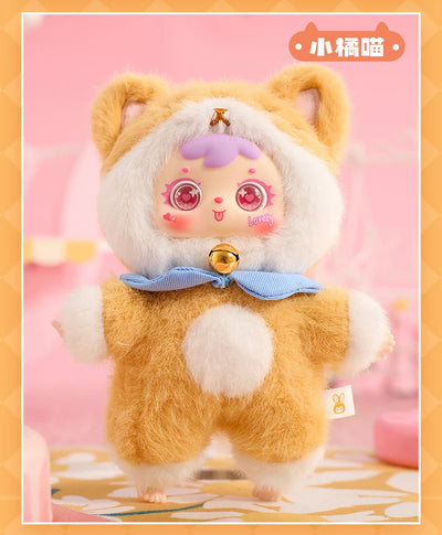Cute plush toy with animal-like design on a pink background