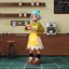 Animated character in a yellow apron standing in a coffee shop