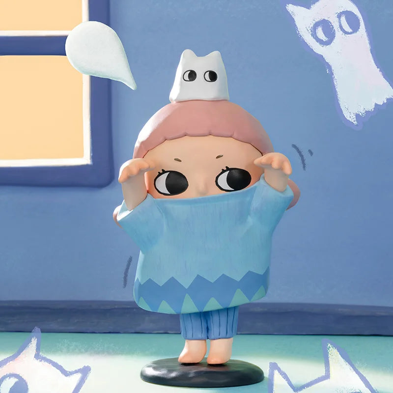 Animated character figurine with a blue sweater and pink hair against a colorful background