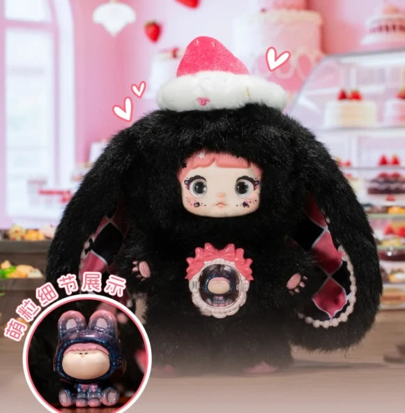 Plush toy with black fur and pink accents in a decorative setting