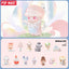 Set of cute figurines with 'Pop Mart' branding on a pastel background