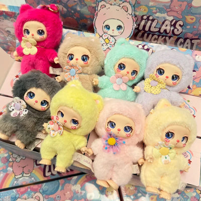 Collection of colorful plush toys with cartoonish designs on a patterned background.