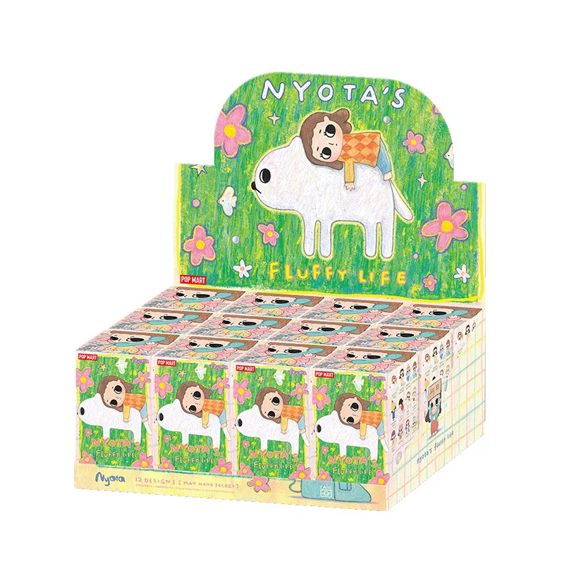 Display box of Nyota's Fluffy Life with cartoon dog design on a white background