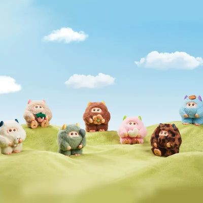 Colorful animal figurines on a grassy field with a blue sky background