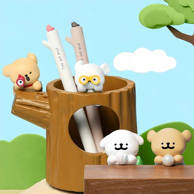 Wooden pencil holder with cartoon animal characters against a colorful background