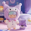 Two plush toys in a room with a purple theme