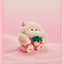 Plush toy with a pink background