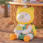 Colorful cartoon character toy with a pacifier on a blurred outdoor background