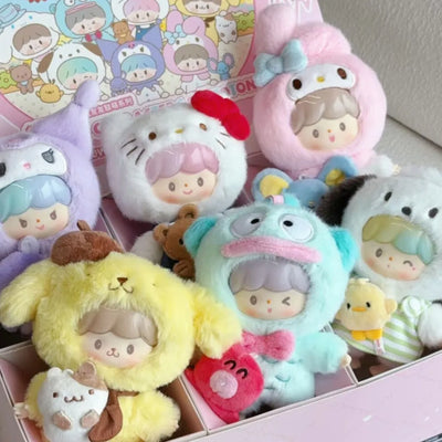 Collection of cute plush toys with cartoon faces in a box