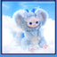Plush toy with angelic design on a cloud background