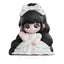 Figurine of a character with black hair and a white bow, wearing a white dress on a white background