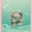 Plush toy with a green outfit and pink shoes on a gradient background with bubbles.