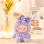 Plush toy with decorative headband on a blurred background