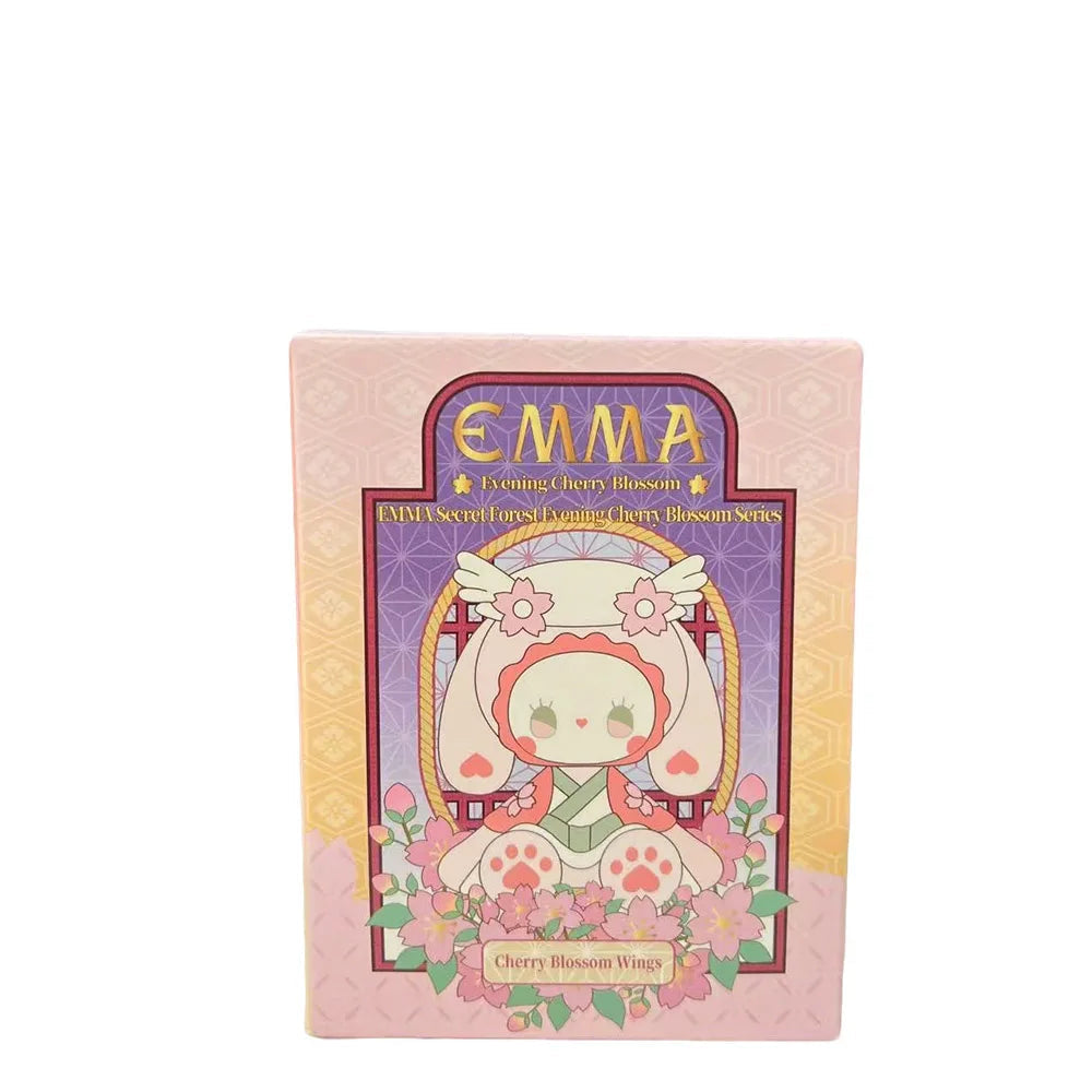 Card packaging with 'EMMA' branding and a character design on a pink background