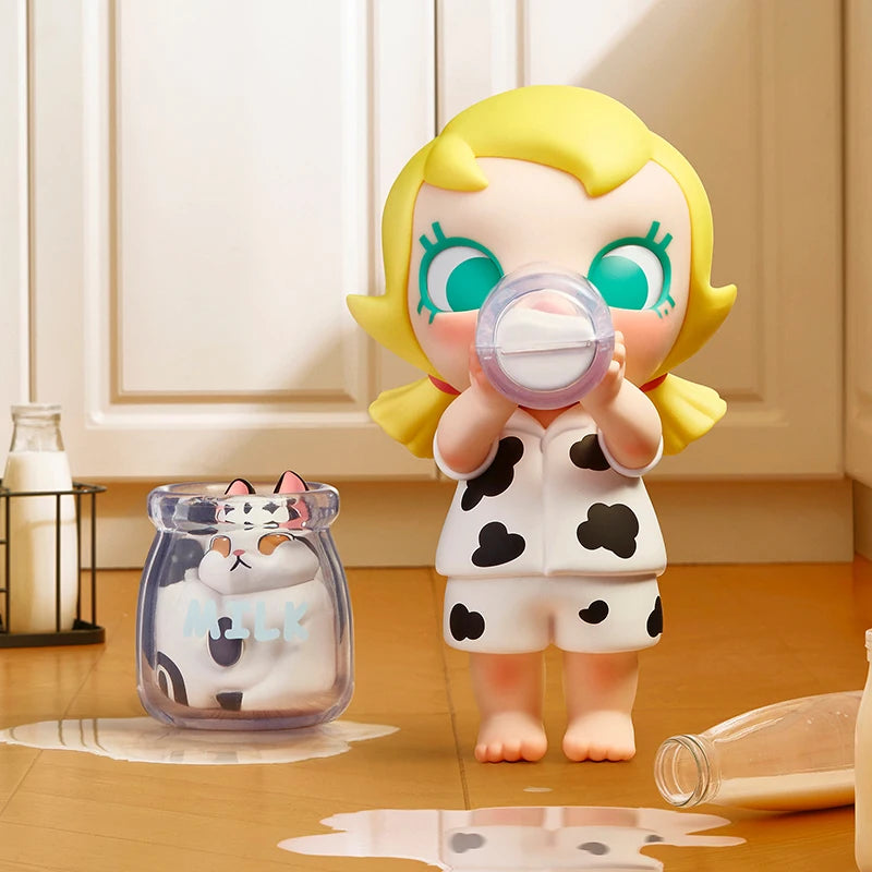 POP MART Baby Molly cow outfit figure close-up from Baby Molly & Baby Tabby blind box series
