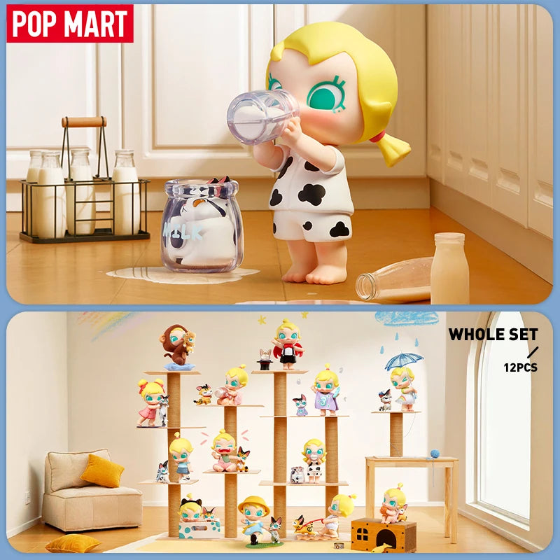 POP MART Baby Molly figure in cow outfit holding milk bottle from Baby Molly & Baby Tabby series